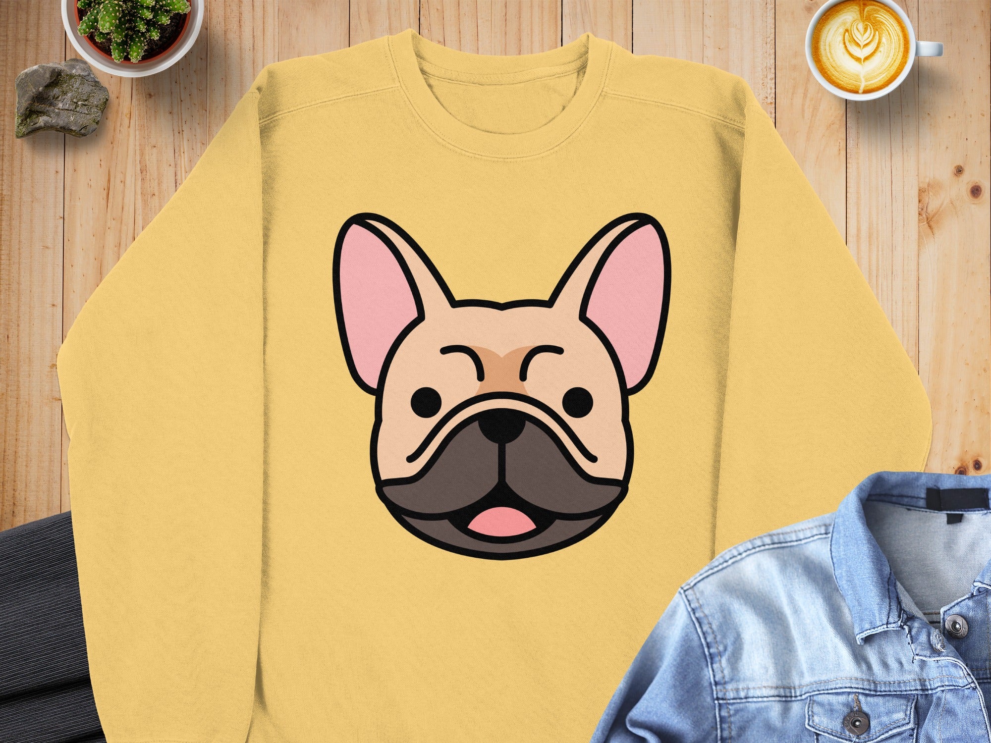Yellow sweatshirt with a French bulldog graphic.